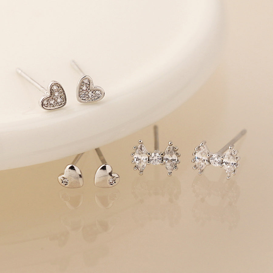 Silver plated triple stud earring set with small round beads, toadstools and flowers with crystal detail