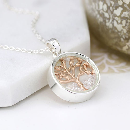 Circle frame necklace with rose gold tree and crystals
