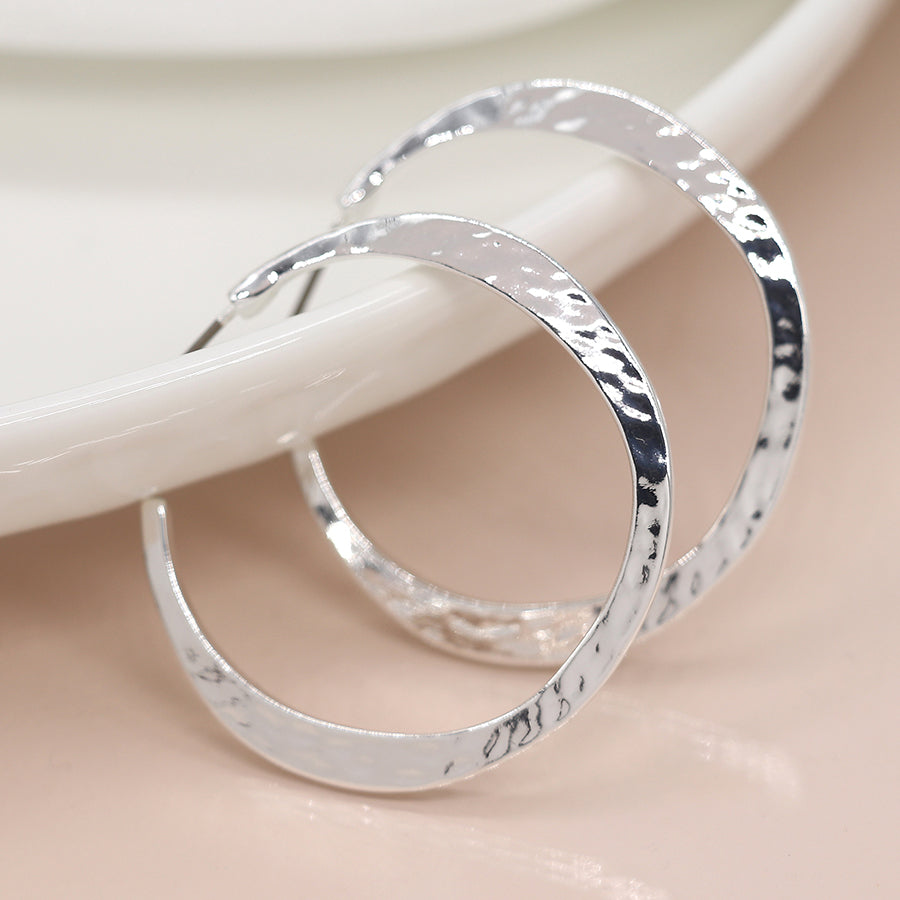 Silver plated irregular hammered open hoop earrings
