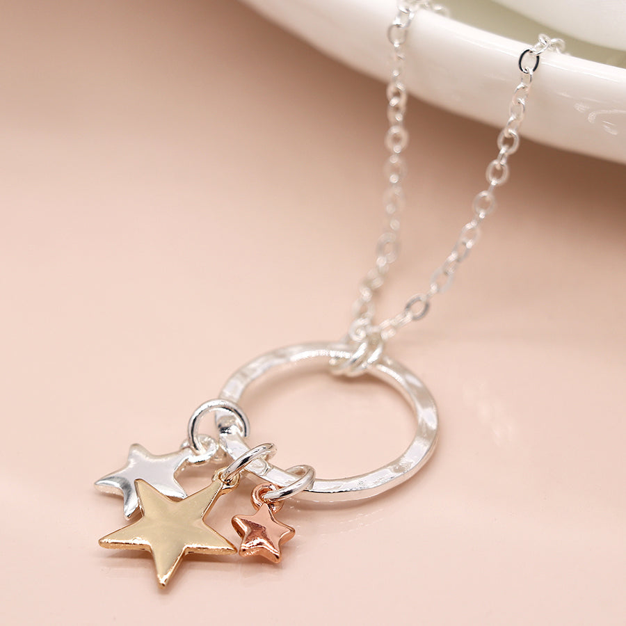 Silver plated necklace with triple stars and hammered hoop