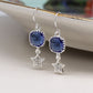 Silver plated blue crystal and sparkle star earrings