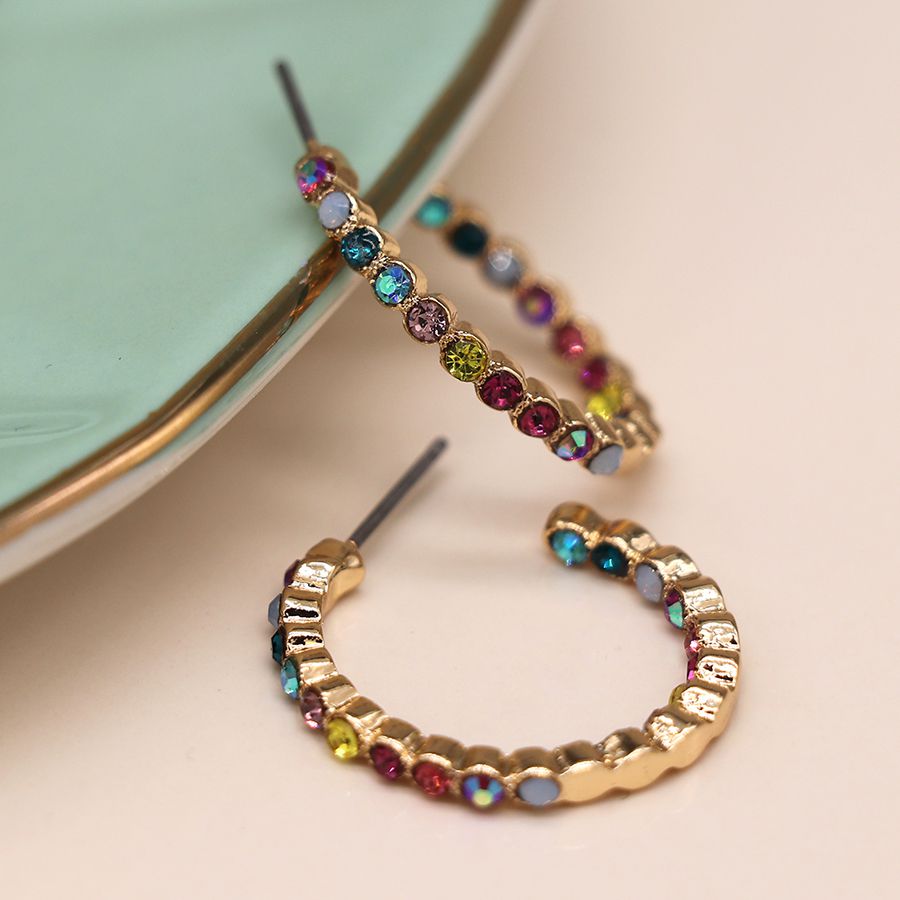 Golden multicoloured crystal inset open hoop earrings