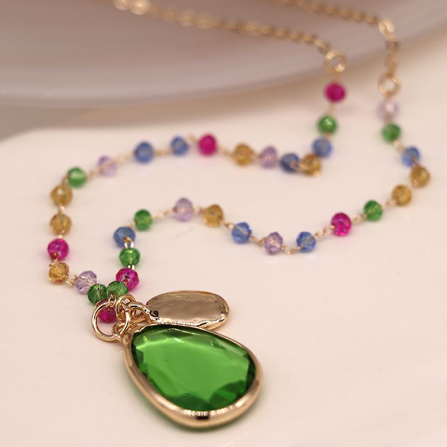 Golden mixed bead and vibrant green drop necklace