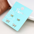 Faux gold bows and crystal bows double stud earring set
