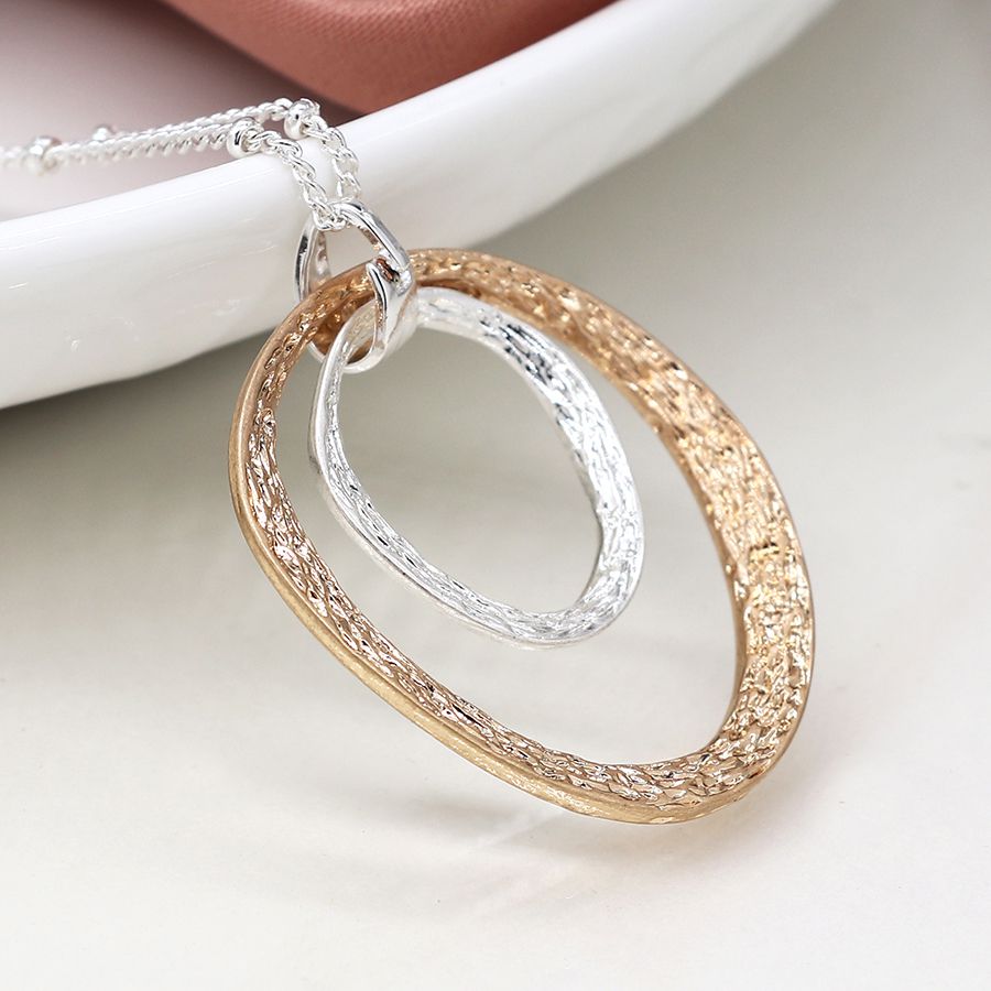 Silver plated and faux gold textured double hoop necklace