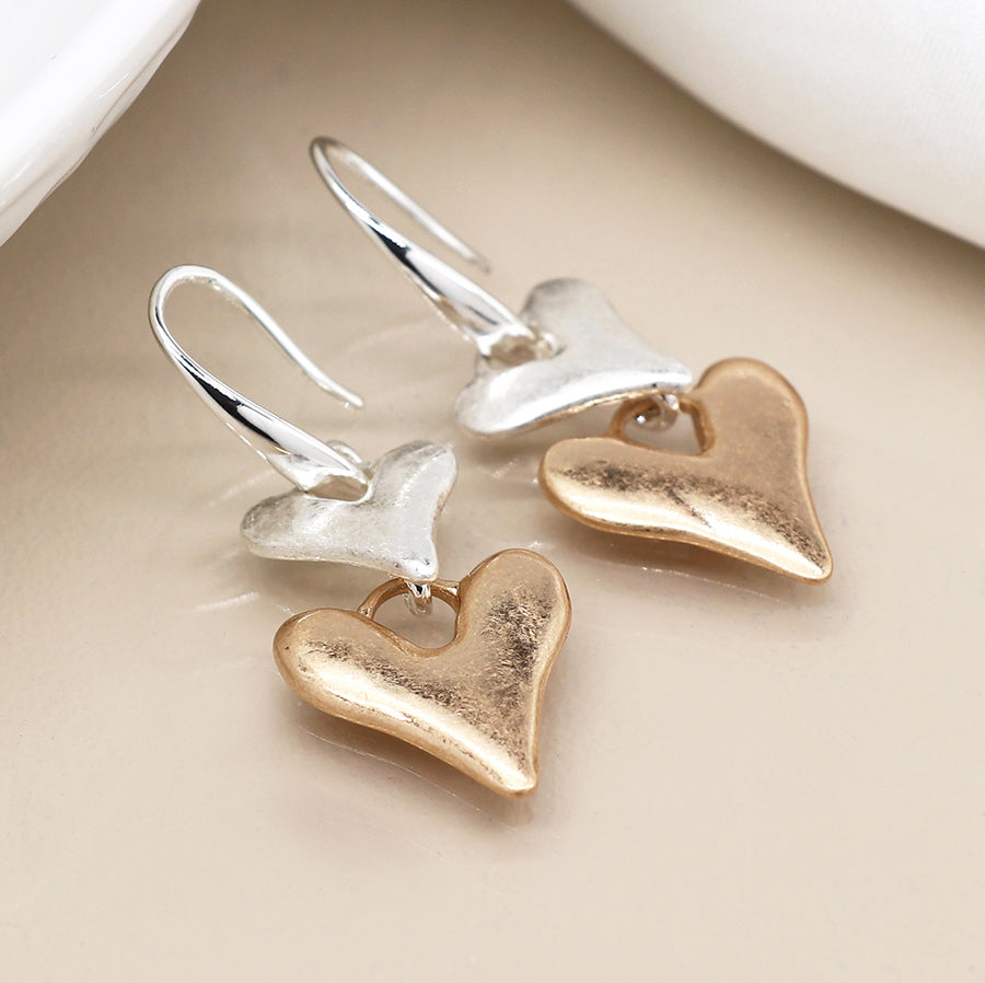Silver plated and faux gold worn finish double heart drop earrings