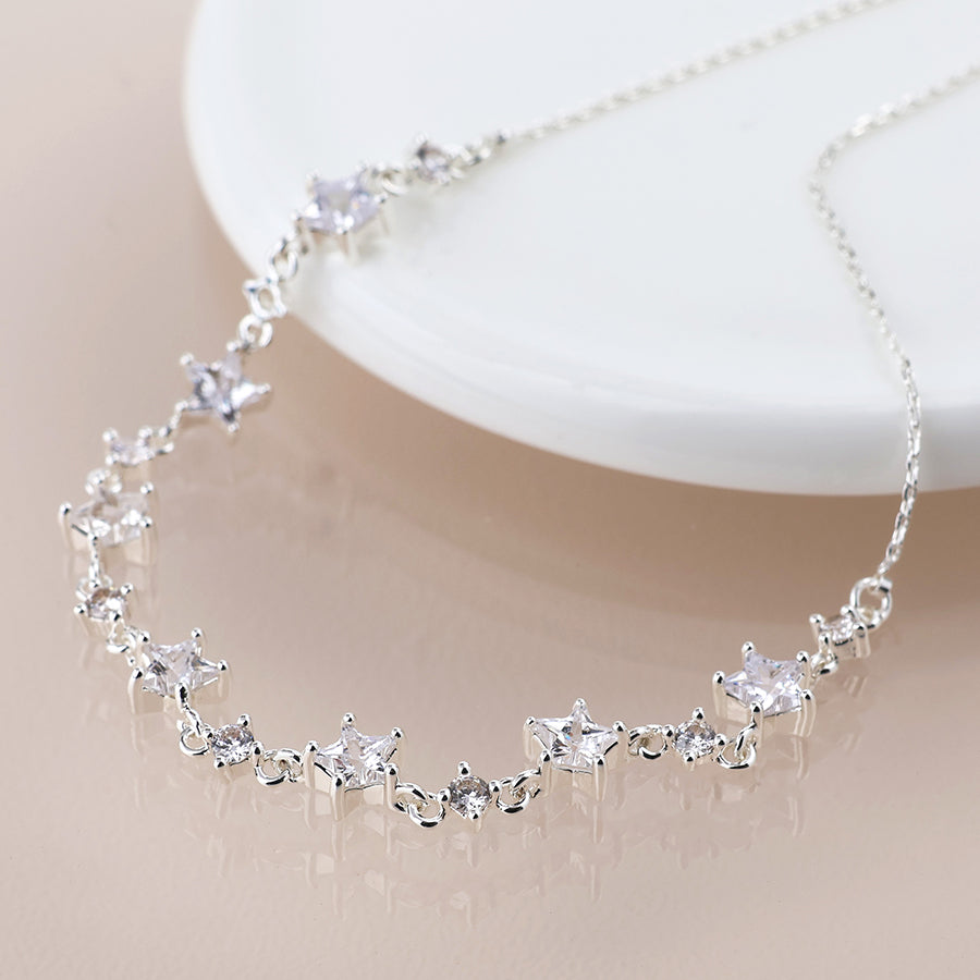 Silver plated crystal star linked station necklace