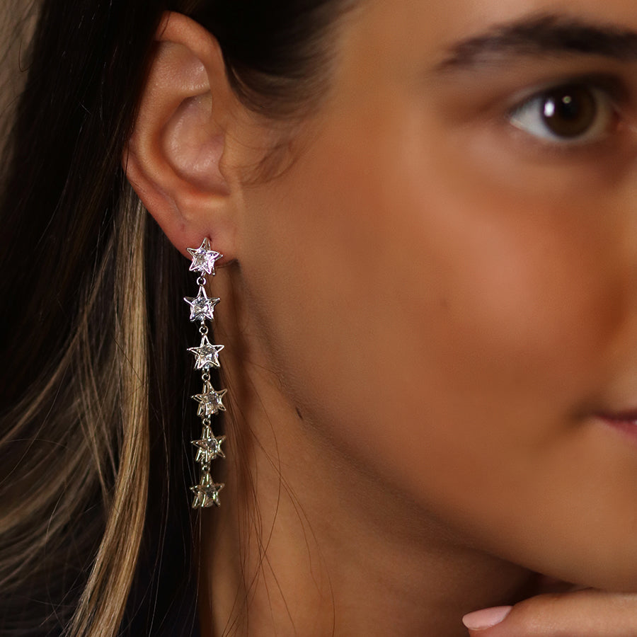 Silver plated crystal centered multi star drop earrings