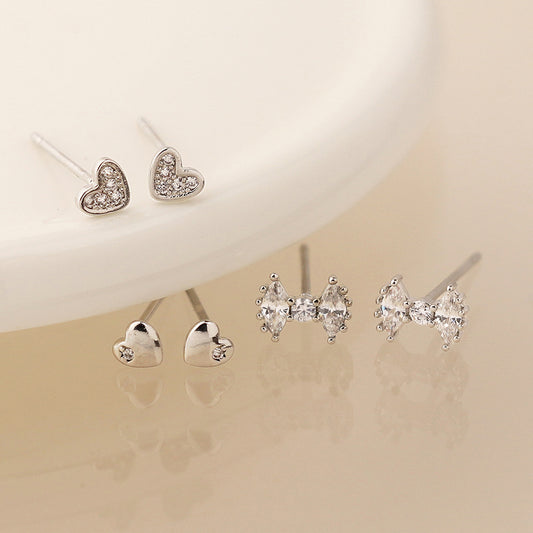 Silver plated triple stud earring set with small round beads, toadstools and flowers with crystal detail