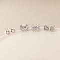 Silver plated bows and hearts triple stud earring set