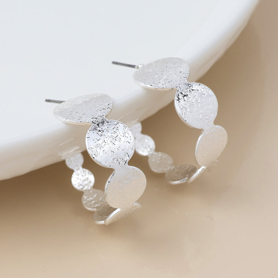 Silver plated dappled disc hoop earrings