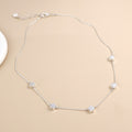 Silver plated flower station necklace