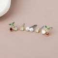 Charlie golden pearl, crystal and cherry heart triple earrings set