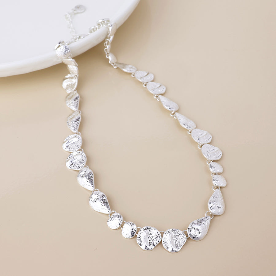Molten silver plated molten organic worn drops necklace