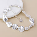 Molten silver plated molten organic worn drops bracelet