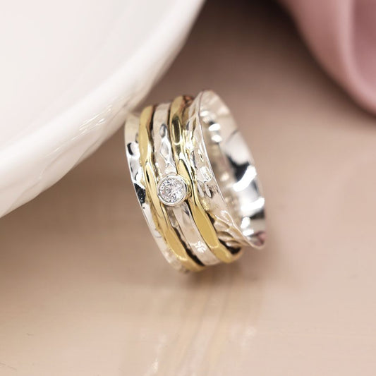 Sterling silver spinning ring with triple band and crystal
